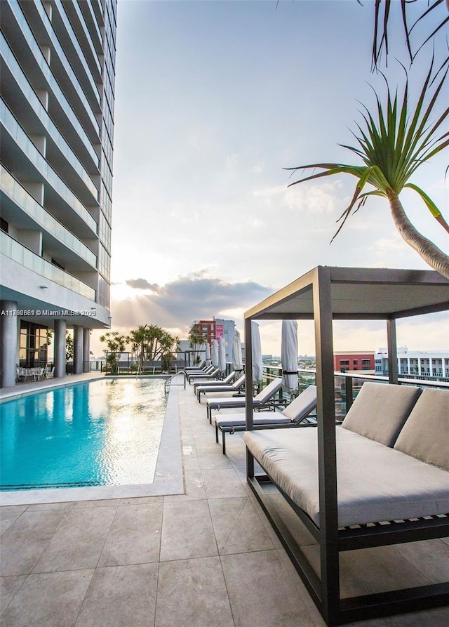 pool with a patio area