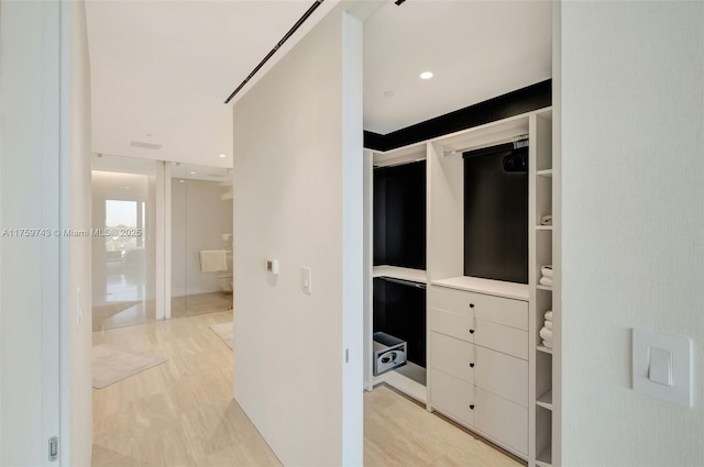 hallway featuring recessed lighting