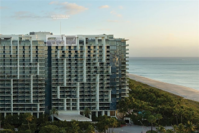 view of building exterior with a water view