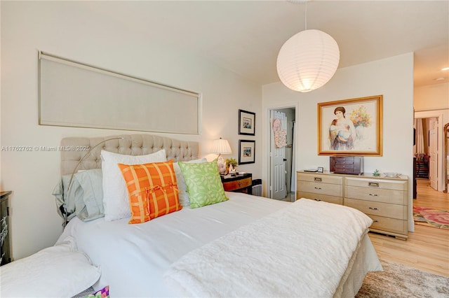 bedroom with light wood-style flooring