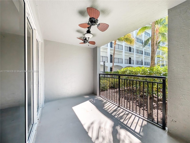 balcony featuring ceiling fan