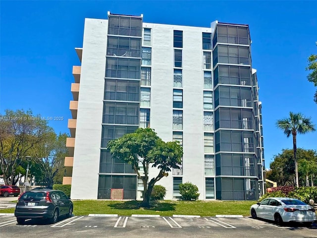 3101 N Country Club Dr Unit 209, Aventura, FL 33180 - view of apartment building / complex featuring uncovered parking