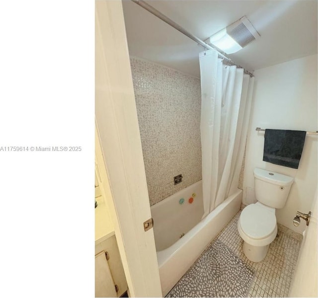 full bathroom featuring tile patterned flooring, shower / tub combo, toilet, and visible vents