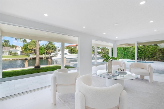 sunroom with a water view