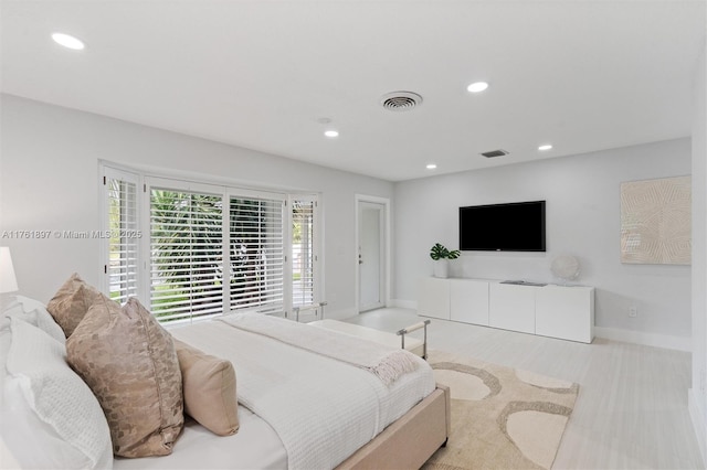 bedroom with recessed lighting, visible vents, and baseboards