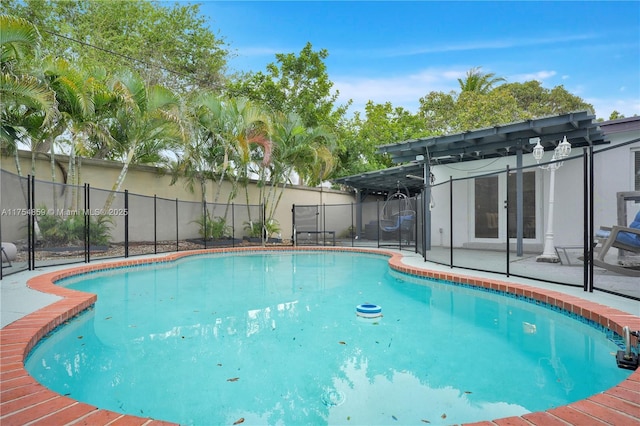 view of pool with a fenced in pool, fence, french doors, a pergola, and a patio