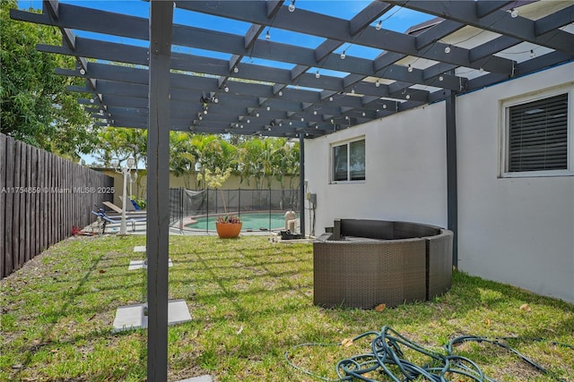 view of yard featuring a fenced in pool, a fenced backyard, and a pergola