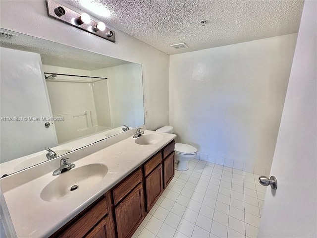 full bathroom featuring a sink, visible vents, and toilet