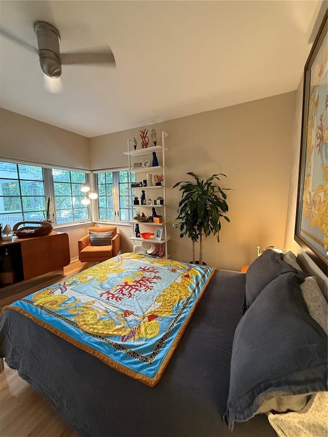 bedroom with wood finished floors