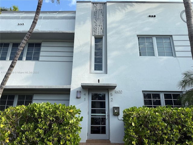 view of front of home featuring stucco siding