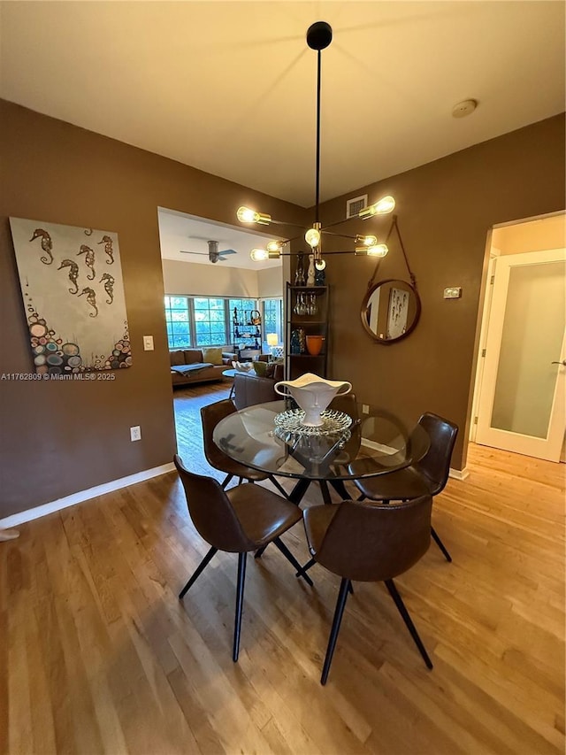 1600 Michigan Ave Unit 1, Miami Beach, FL 33139 - dining room with wood finished floors and baseboards