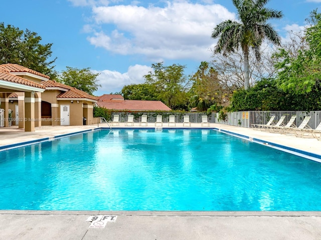 community pool with fence