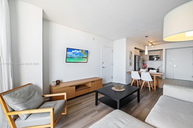 living area with light wood finished floors