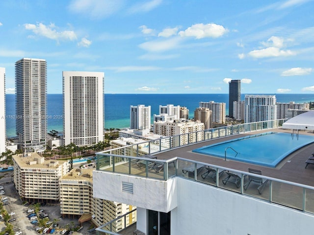 exterior space with a water view and a view of city