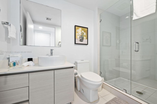 full bath featuring visible vents, a shower stall, toilet, tile patterned floors, and vanity