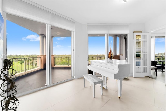 sunroom / solarium with a healthy amount of sunlight