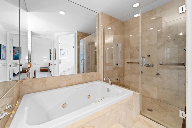 ensuite bathroom featuring recessed lighting, a stall shower, ensuite bath, and a whirlpool tub