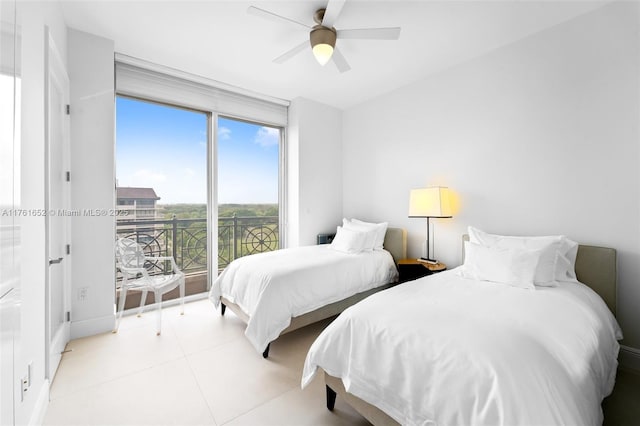 bedroom featuring access to outside, light tile patterned floors, and a ceiling fan