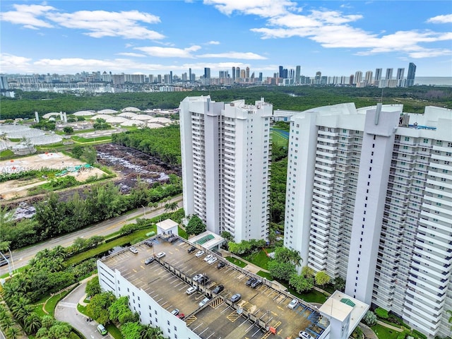 drone / aerial view featuring a city view