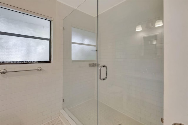 full bath featuring a stall shower