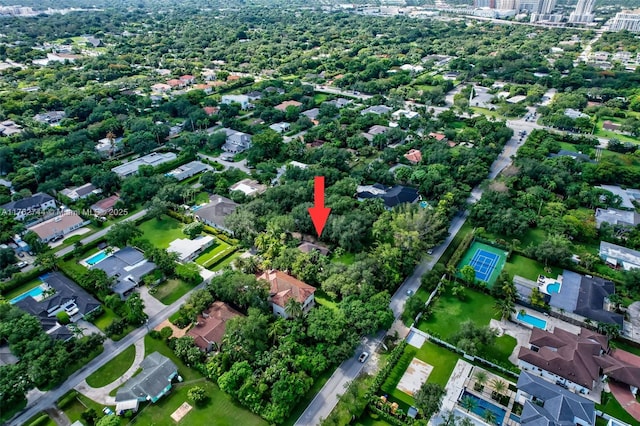 birds eye view of property with a residential view