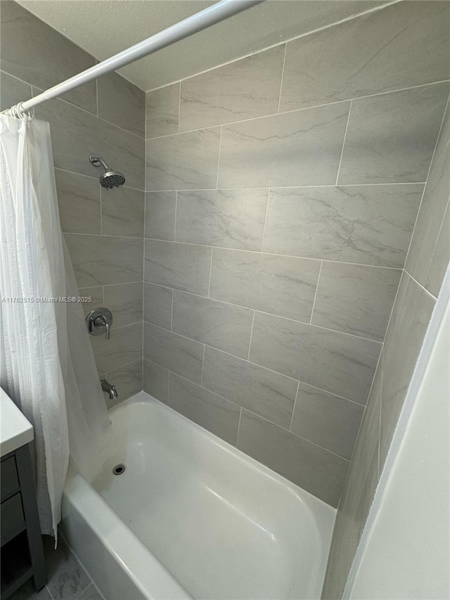 full bath with vanity and shower / bath combination with curtain