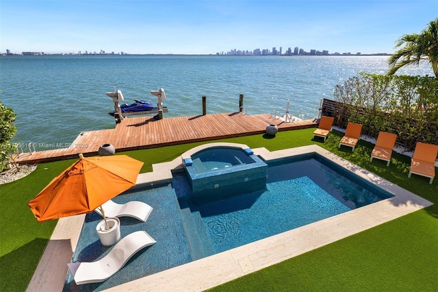 view of pool featuring a city view, a pool with connected hot tub, a dock, and a water view