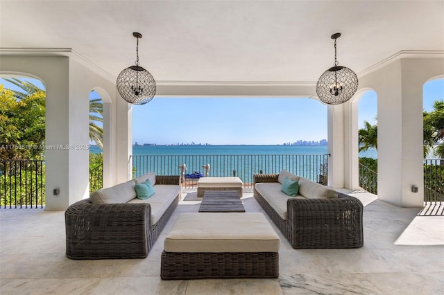 view of patio / terrace featuring a water view and an outdoor hangout area