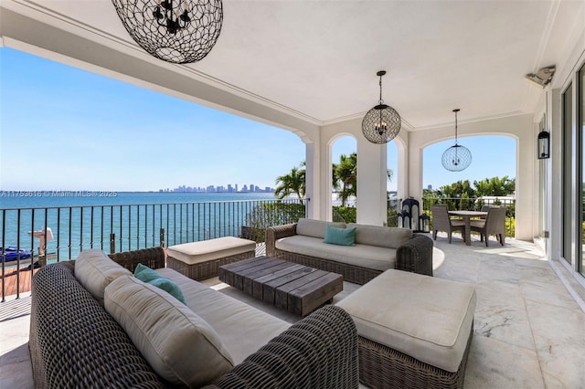 view of patio / terrace featuring an outdoor living space and a water view