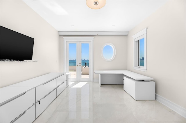 bedroom featuring french doors, baseboards, and access to outside