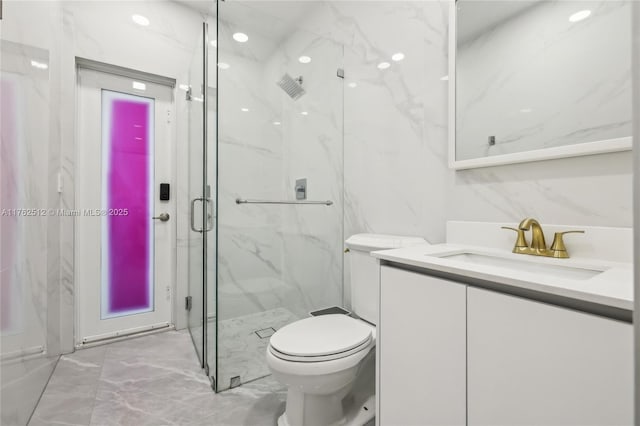 full bath featuring a marble finish shower, toilet, recessed lighting, vanity, and marble finish floor