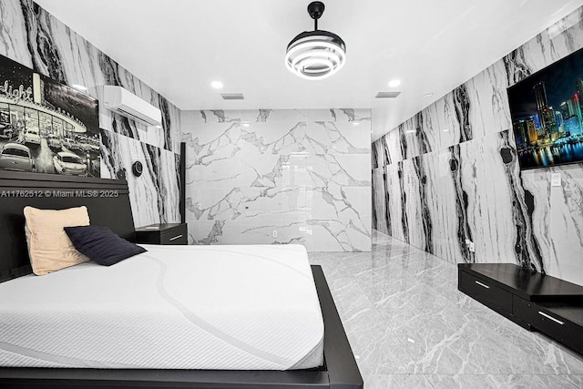 bedroom featuring tile walls, stone wall, visible vents, and marble finish floor