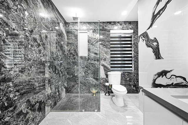 full bathroom with toilet, marble finish floor, tile walls, a shower stall, and vanity