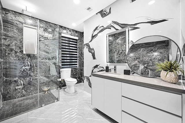 full bathroom with vanity, visible vents, a shower stall, tile walls, and marble finish floor