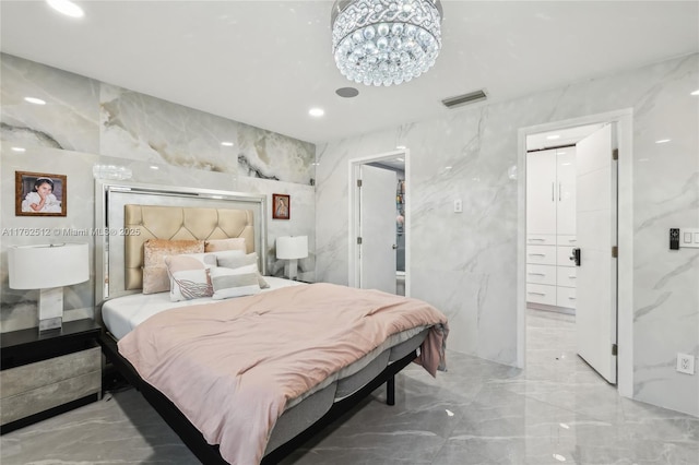 bedroom with visible vents, recessed lighting, marble finish floor, and stone wall