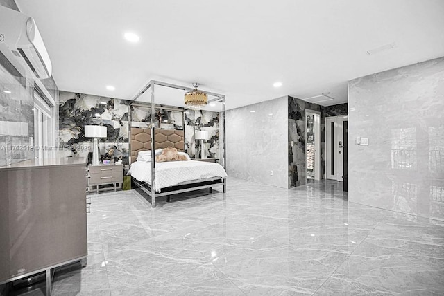 bedroom featuring tile walls, marble finish floor, stone wall, and a wall unit AC