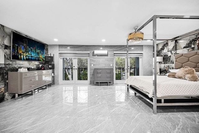 bedroom with marble finish floor, french doors, a wall unit AC, and access to outside