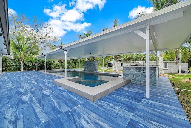 exterior space featuring an outdoor kitchen