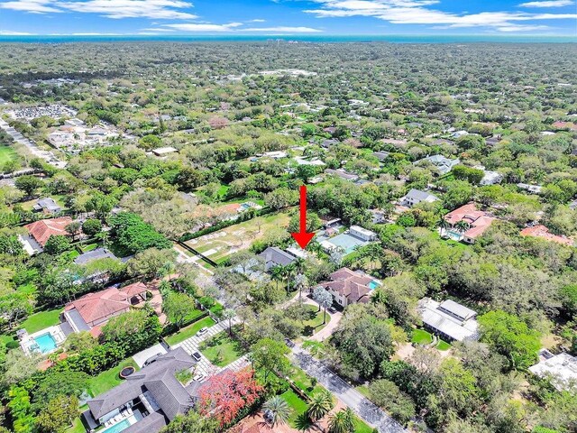 birds eye view of property with a residential view