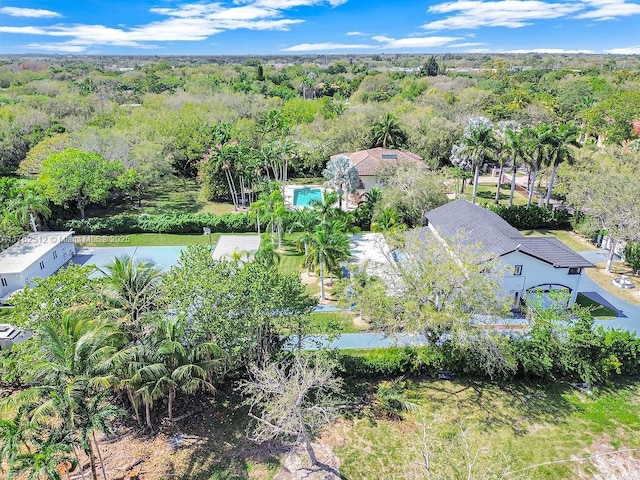 aerial view featuring a view of trees