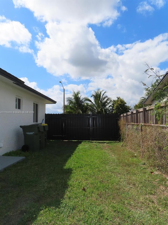 view of yard with fence