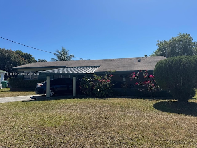 exterior space featuring a carport