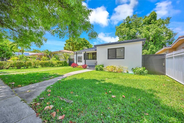 2261 SW 26th St, Miami, FL 33133 - view of front of property featuring stucco siding