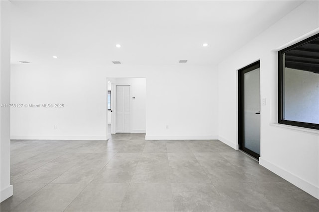 2261 SW 26th St, Miami, FL 33133 - unfurnished room with recessed lighting and baseboards