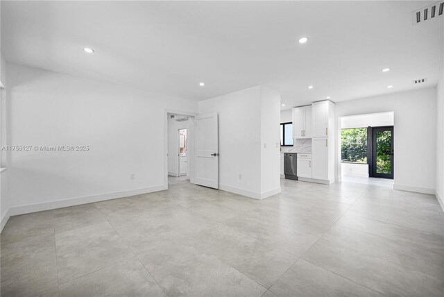 2261 SW 26th St, Miami, FL 33133 - spare room with recessed lighting and baseboards
