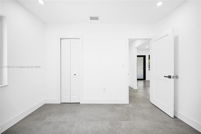 2261 SW 26th St, Miami, FL 33133 - empty room with baseboards and recessed lighting