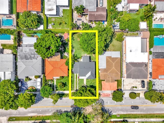 2261 SW 26th St, Miami, FL 33133 - aerial perspective of suburban area with a pool area and property boundaries highlighted