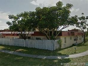 exterior space with a fenced front yard