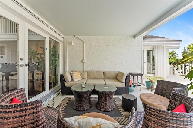 view of patio / terrace featuring an outdoor living space and french doors