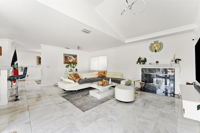 living area with visible vents, marble finish floor, ornamental molding, and a premium fireplace